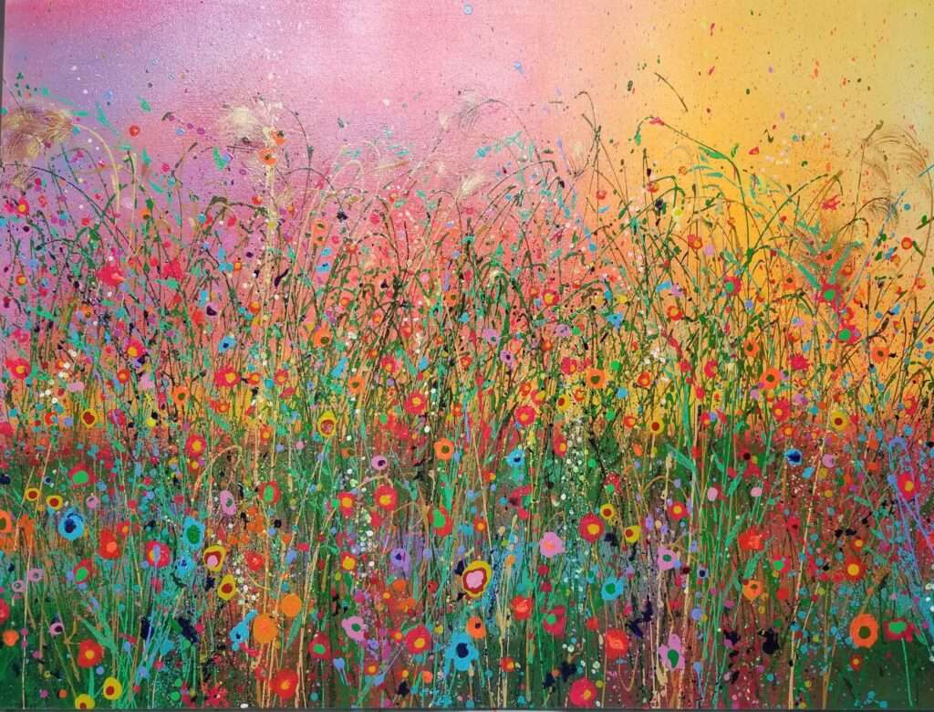 Colorful field of painterly flowers shown against a purple and yellow background.